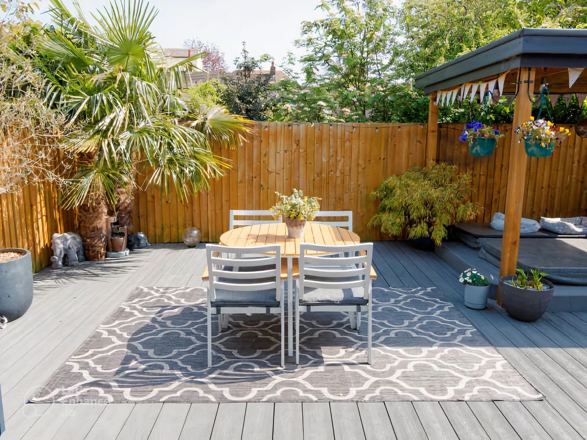 Exterior deck painting in Hornsea by Hull Decorators, garden deck with dining area