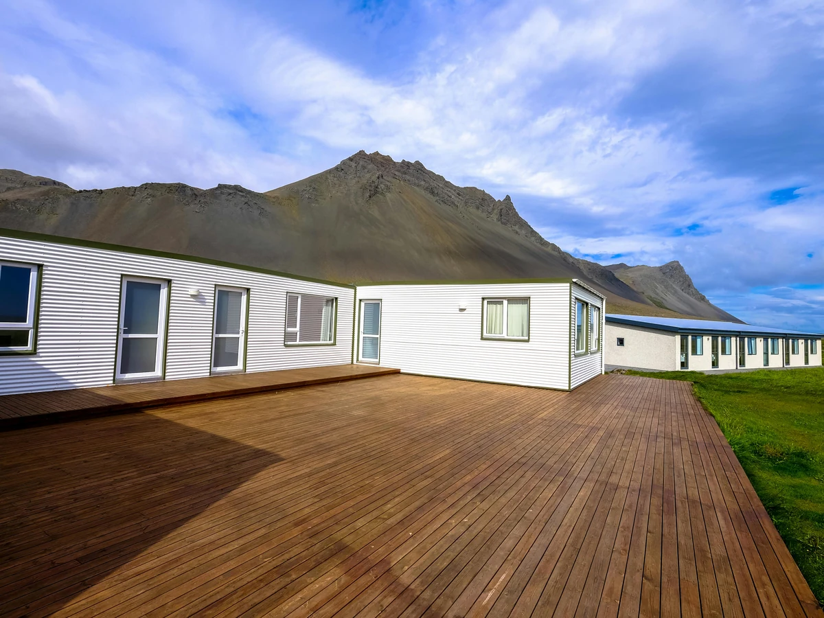 Large wooden deck painting in Hornsea by Hull Decorators, coastal exterior wood painting
