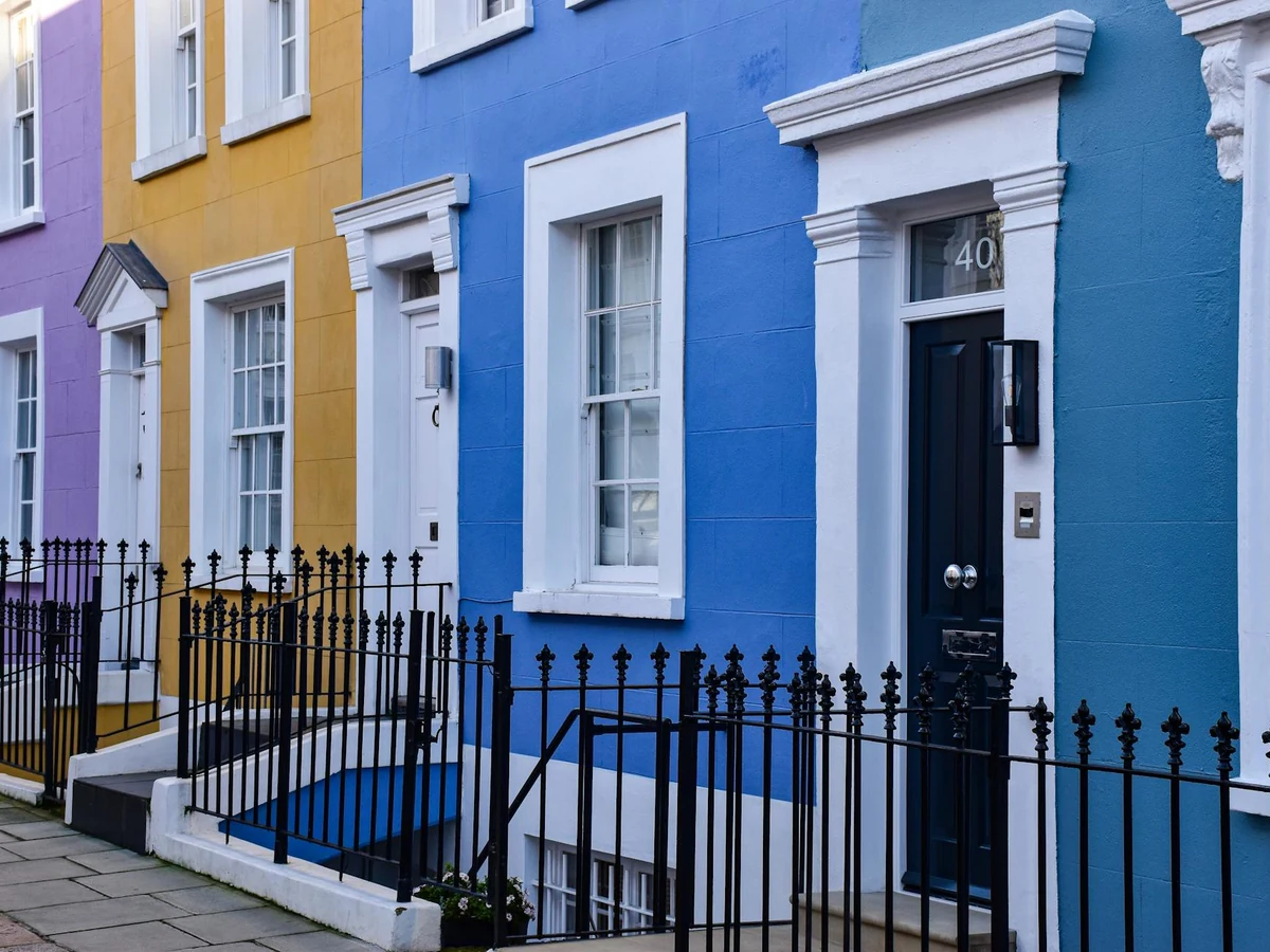 Exterior painting of colourful terraced houses in Bridlington by Hull Decorators, professional painters