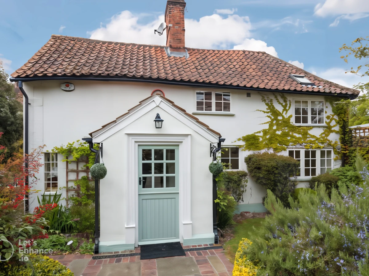Exterior painting of a white country cottage in Swanland by Hull Decorators, professional painters and decorators