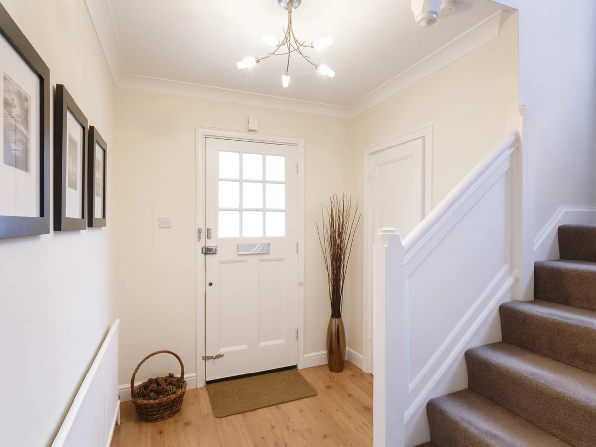 Hallway entrance painting bright white finish in Brough by Hull Decorators