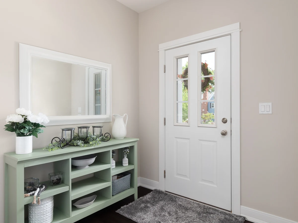 Hallway painting with beige walls by Hull Decorators in Hessle